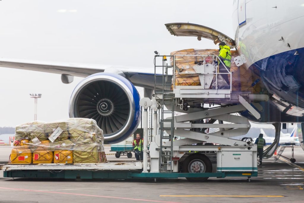 Loading cargo into the aircraft before departure in Domodedovo airport in Moscow Russia Freight Forwarding Services